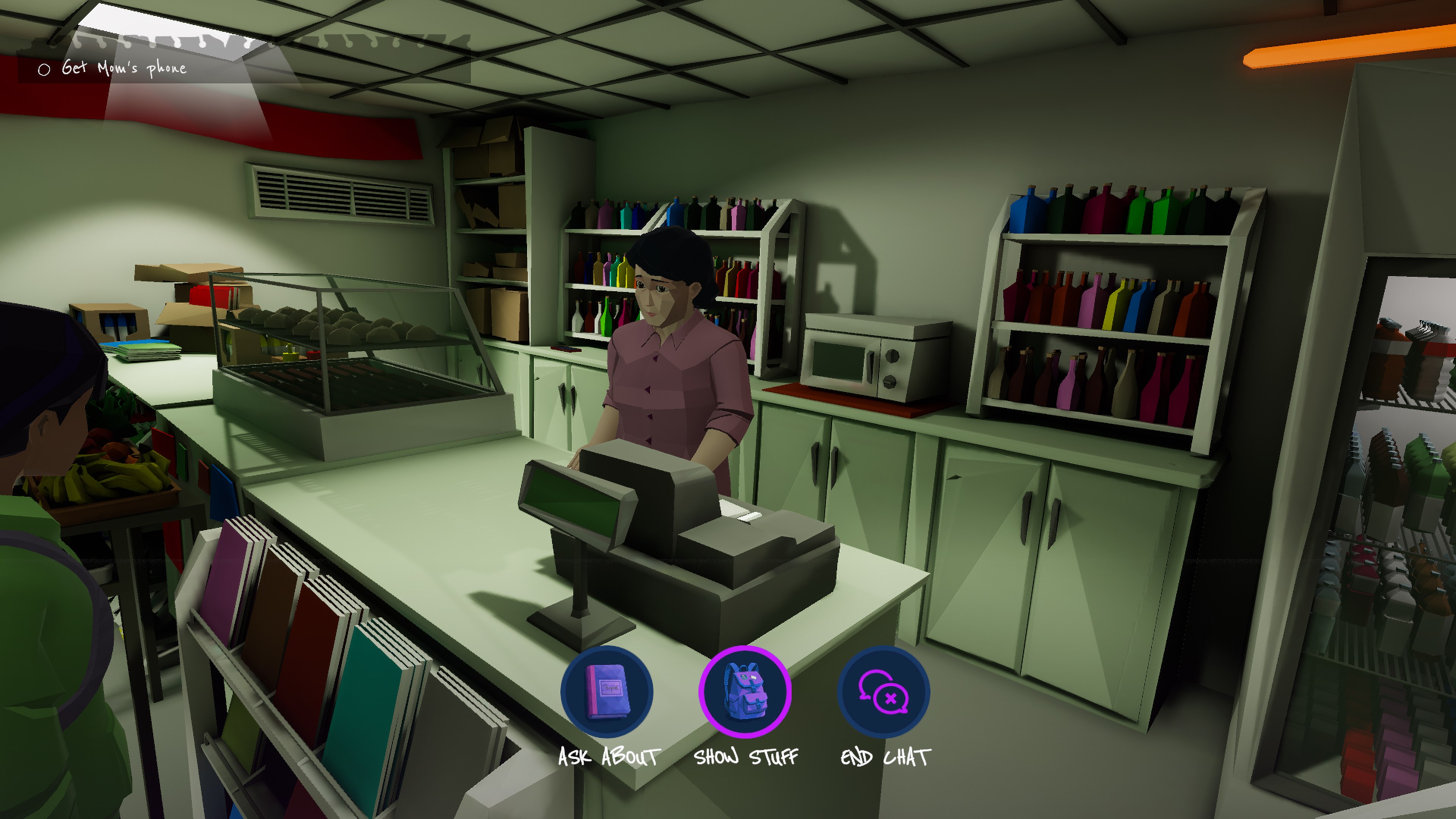 Interior view of a local convenience store with the cashier.