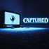 CAPTURED